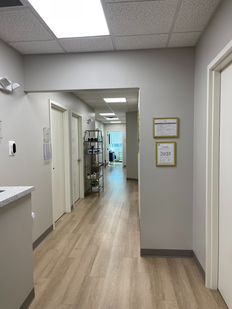 Hallway and treatment rooms at the Elite Personalized Medicine office in Dacula, GA